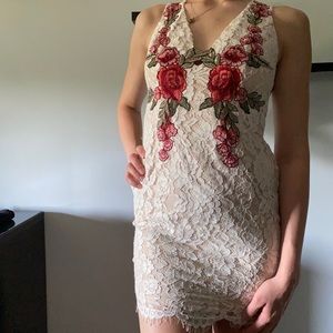 White lace dress with flower appliqués